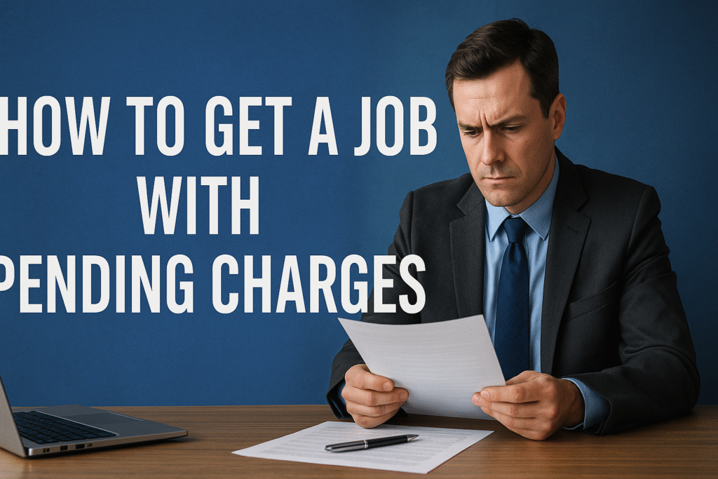 Man in a suit reading a document at desk with text: How to Get a Job with Pending Charges
